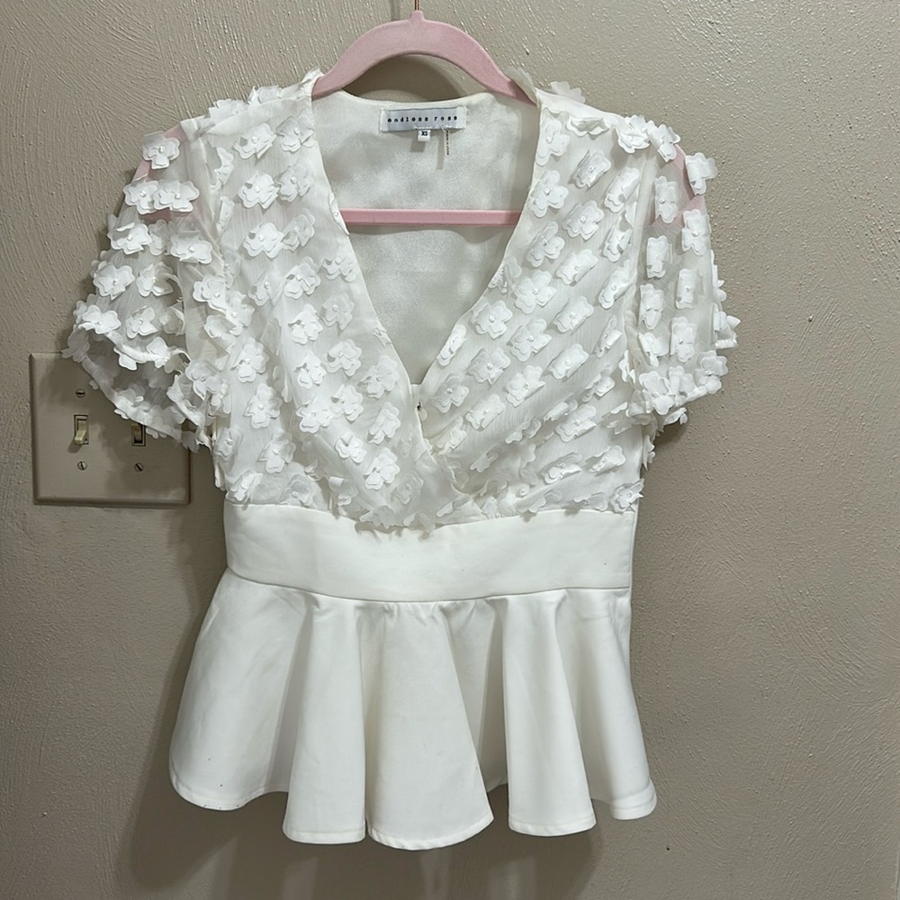 Peplum white flower blouse